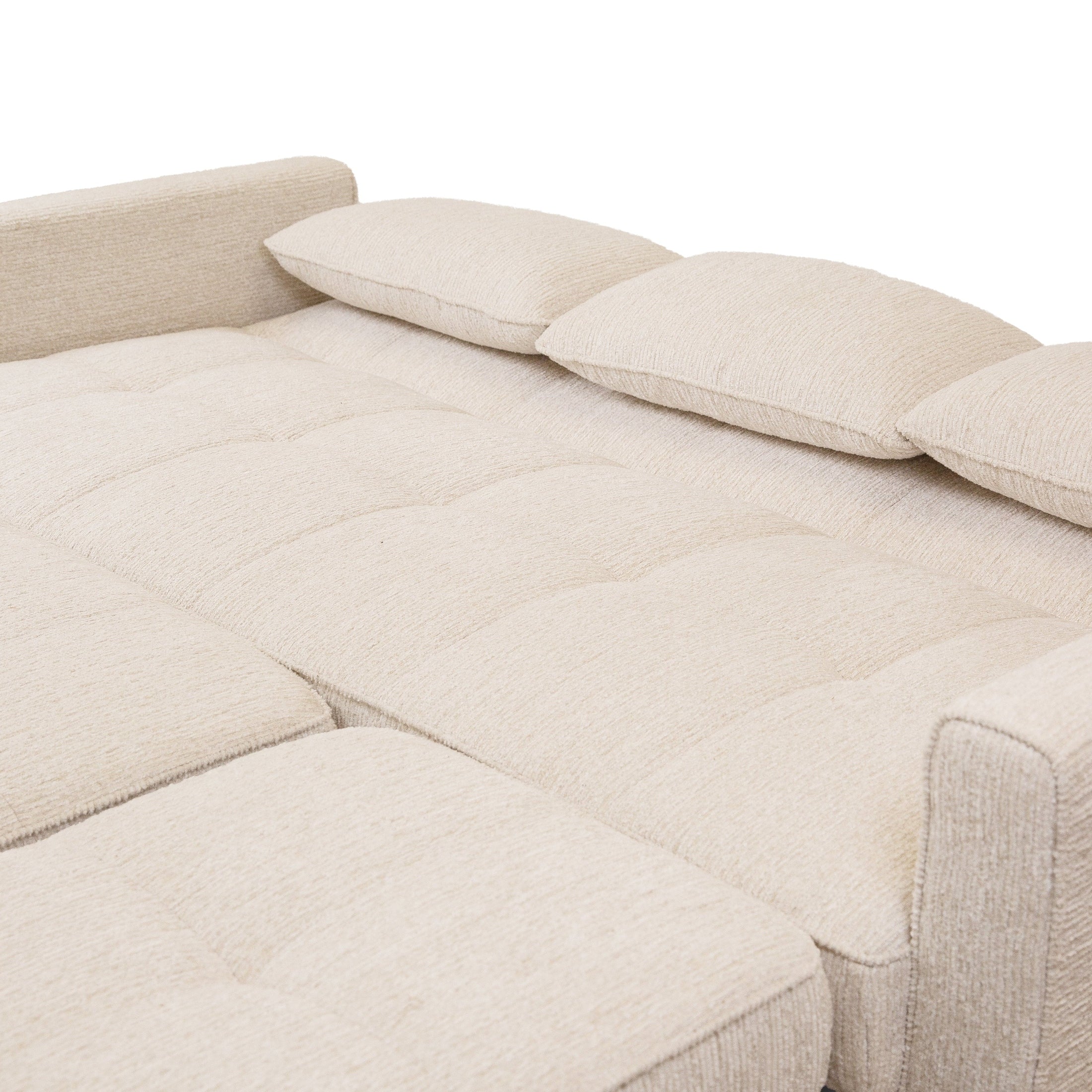 Front view of the Hedal Sofa Sectional Sleeper in cream textured fabric with matching throw pillows