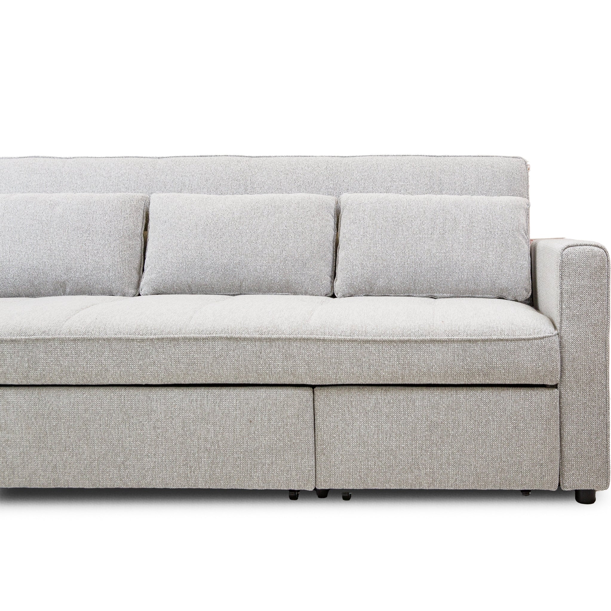 Front view of the Hedal Sofa Sectional Sleeper in cream textured fabric with matching throw pillows