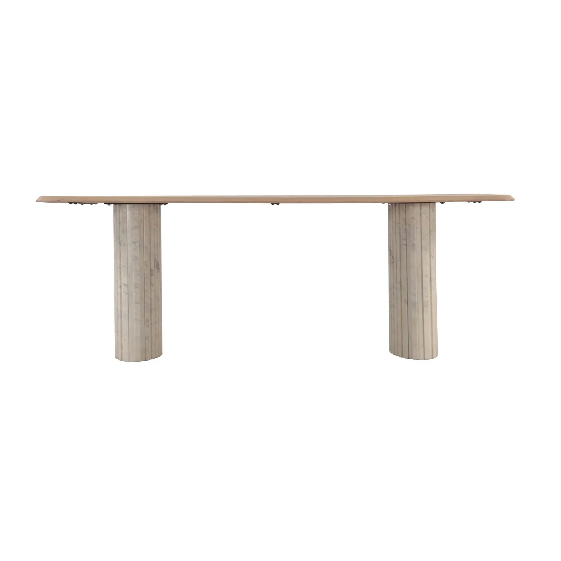 Front view of the Hedron dining table in a natural oak finish featuring rounded corners and two thick ribbed pedestal legs