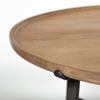 Close-up perspective focusing on the smooth beveled edge of the brown solid wood tabletop and the secure metal bracket attachment