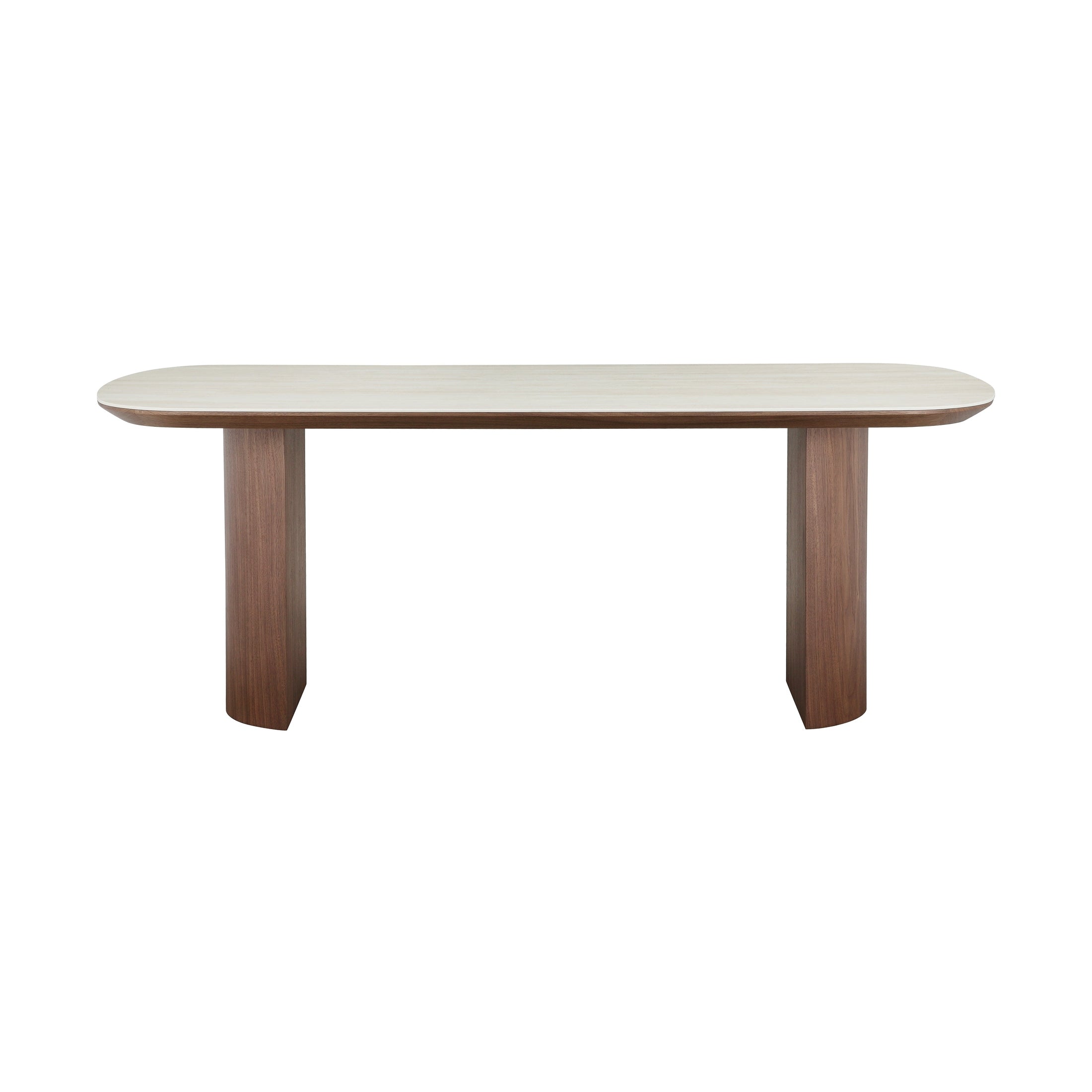 Front view of the Hola oval dining table featuring a light cream ceramic top and two substantial walnut-finished wood pedestal bases