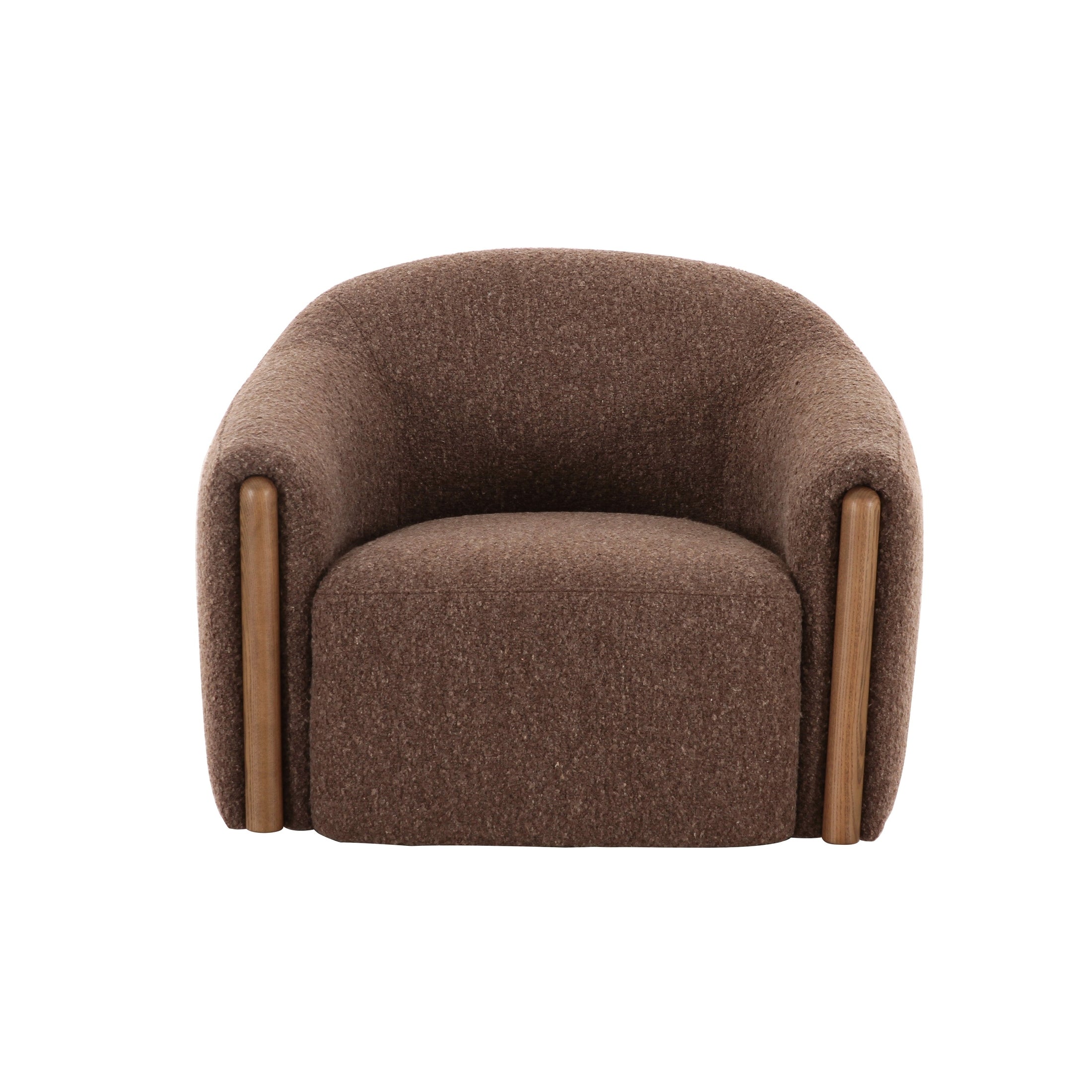 Three-quarter perspective of the coffee brown Holmvik chair highlighting the thick sculptural legs and deep plush seat