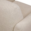 Macro shot of the upper backrest upholstery highlighting the premium tactile bouclé finish