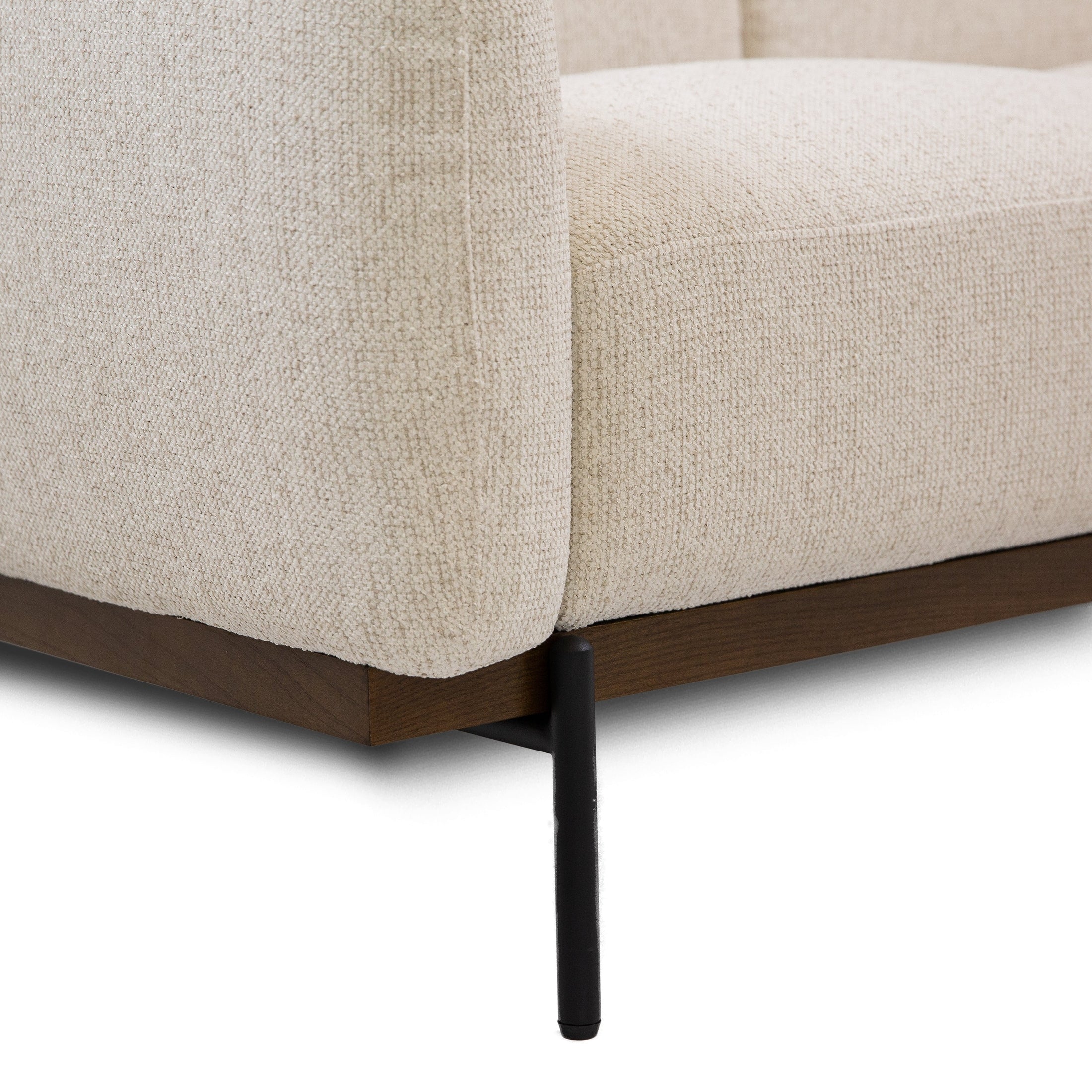 Straight front view of the Idony Loveseat in beige boucle fabric with slim black legs