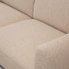 Detailed view of the interior corner and armrest of the Idony Loveseat
