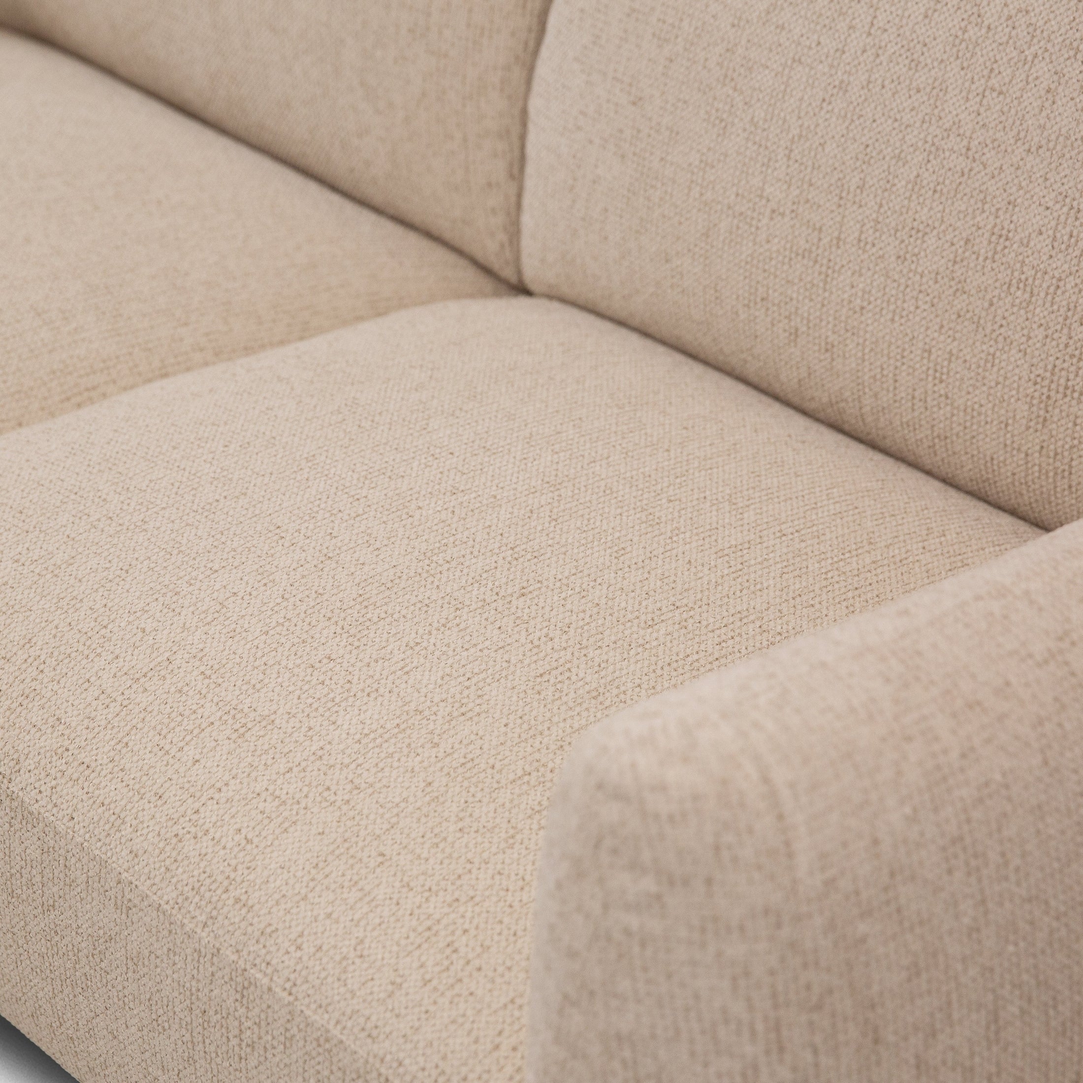 Straight front view of the Idony Loveseat in beige boucle fabric with slim black legs