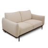 Perspective view of the Idony Loveseat emphasizing the modern silhouette and dark wood base trim