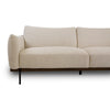 Close-up of Idony beige fabric sofa seat with curved armrest, wooden base, and black metal legs