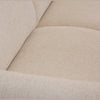 Close-up detail of Idony sofa seat cushion in beige textured fabric upholstery