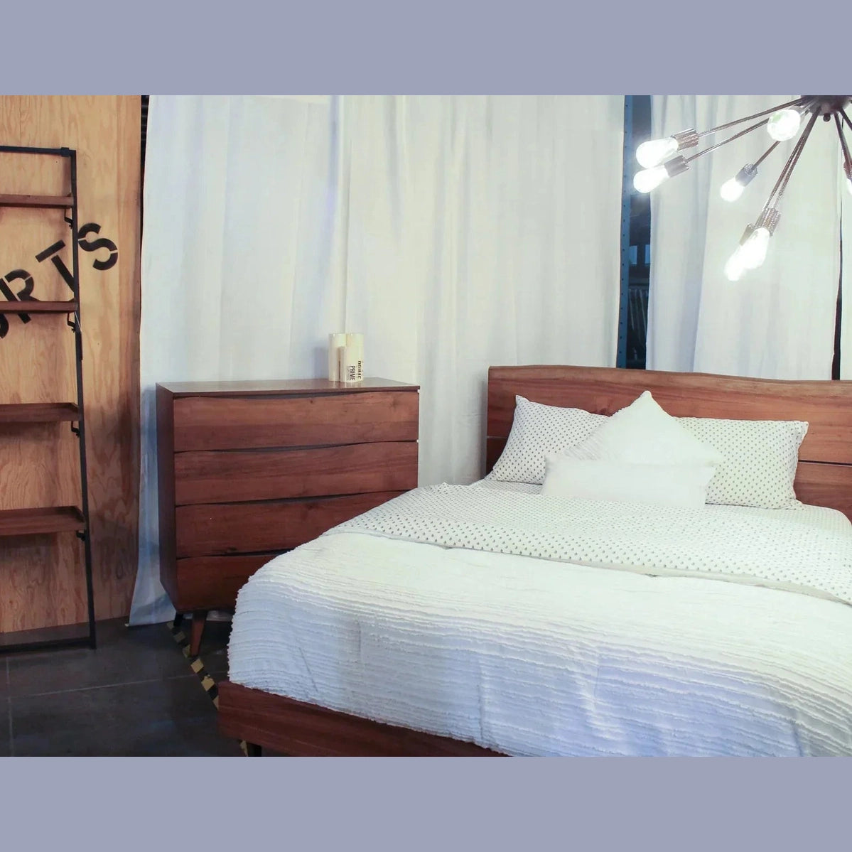 Straight-on front view of the D-Bodhi wall rack featuring a slim black metal frame and four reclaimed wood tray shelves