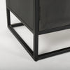 Close-up view of the sturdy square-profile black metal base and floor protectors