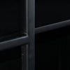 Macro shot highlighting the durable black metal frame construction and the textured finish of the glass door paneling