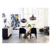 Studio lifestyle shot featuring the natural oak Instinct table styled with black modern chairs and industrial pendant lighting