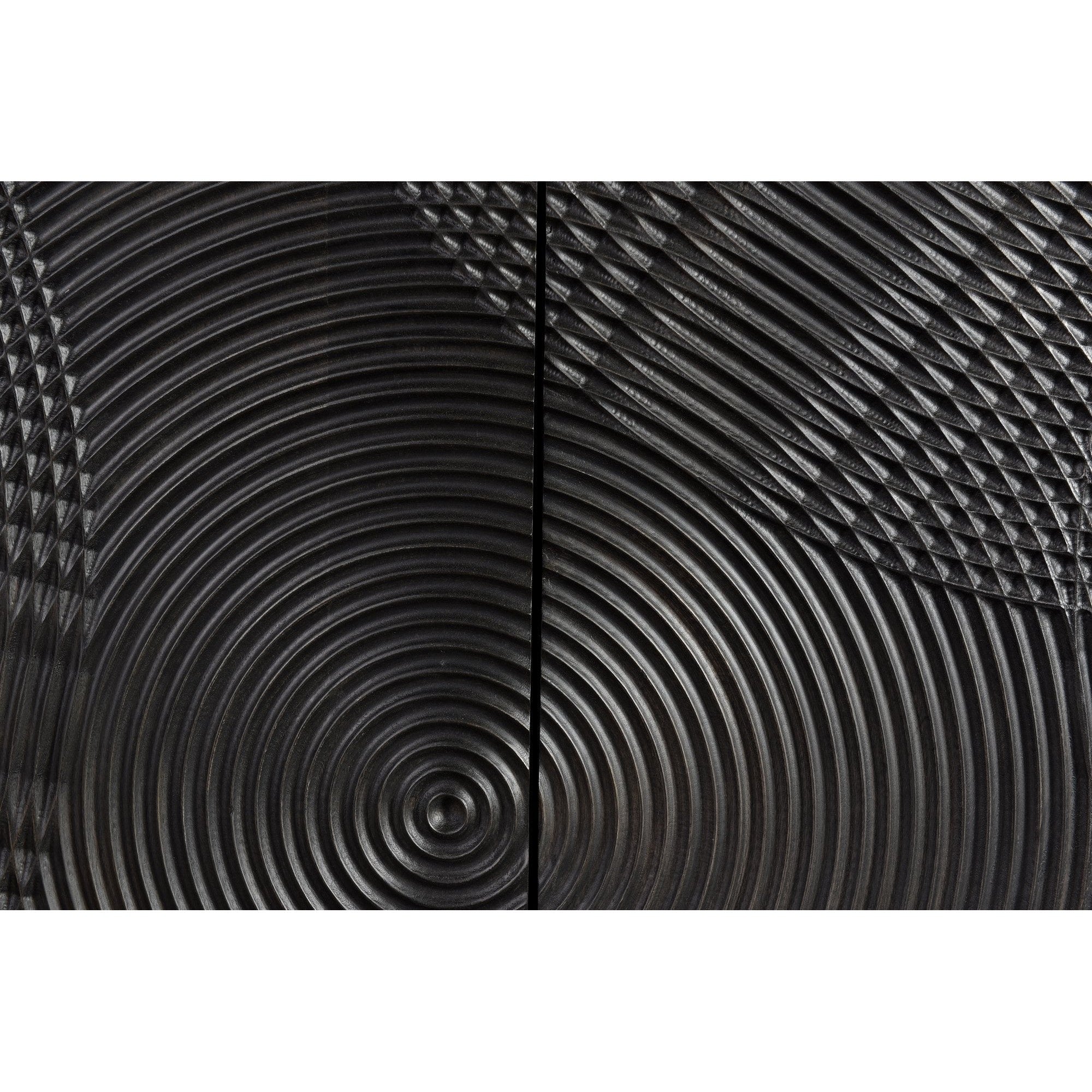 Three-quarter perspective view of the Spiral sideboard featuring a matte black finish and intricate circular relief carvings across four doors