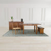Wide-angle lifestyle view of the Irish Coast bench styled in a contemporary open-concept dining area