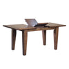 Front view of the Irish Coast small extension dining table in an African Dusk finish with the butterfly leaf mechanism partially open