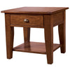 Product view of the rustic solid wood side table in a warm Sundried pine finish with a traditional cup pull handle