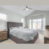 Real-home lifestyle shot featuring the 7-drawer dresser styled in a bright bedroom with neutral bedding and natural light