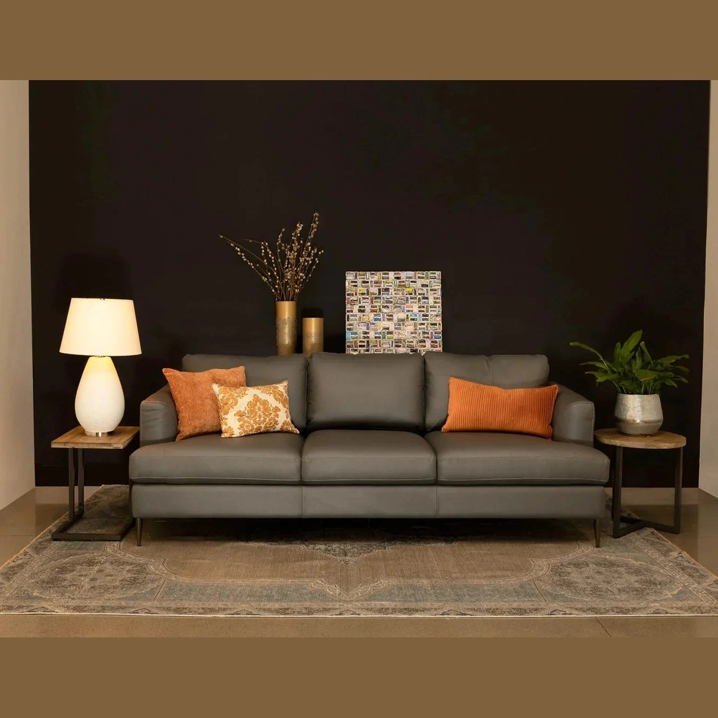 Front view of the Irondale round side table featuring a light oak finished top and a minimalist black metal cross-base frame