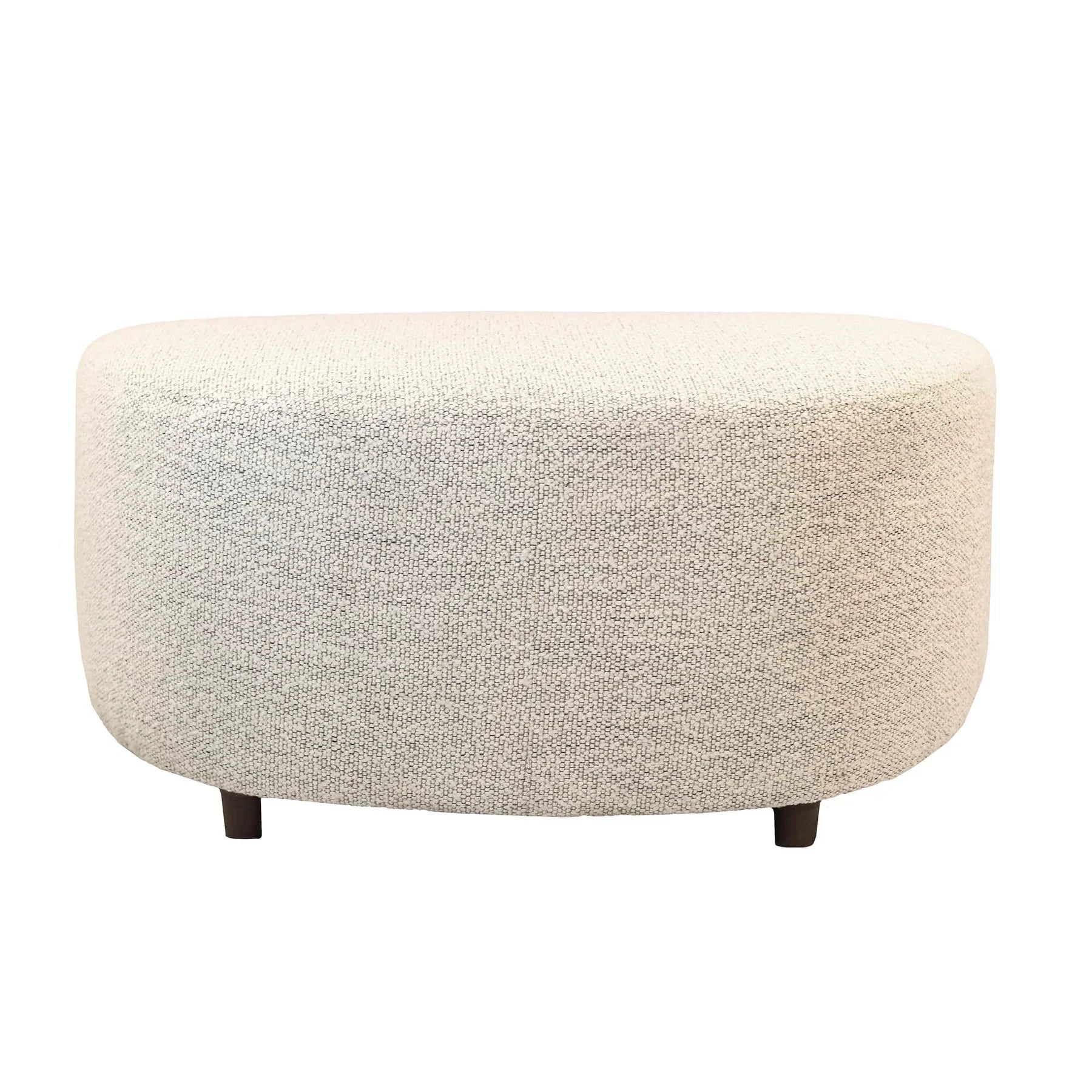 Side profile view showcasing the flat back and rounded front curve of the Isabella upholstered ottoman