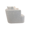 Side profile of Isabella curved sofa in textured fabric with rounded arms