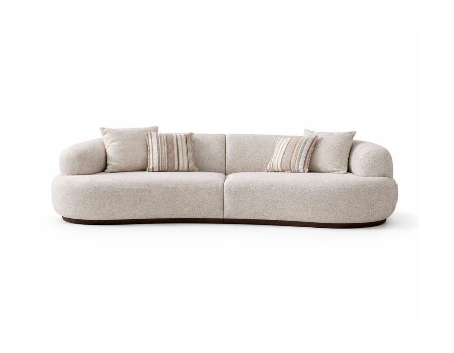 Isla 2-piece modular curved sofa in cream fabric with rounded modern design and low wooden base