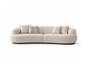 Isla 2-piece modular curved sofa in cream fabric with rounded modern design and low wooden base