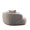 Side view of Isla 3-piece modular curved sofa in cream fabric with rounded modular design