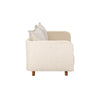 Side profile of the Ivory Coast loveseat highlighting the clean lines and natural wood finish legs