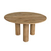 Three-quarter perspective view of the Jasper round dining table in a natural oak finish featuring three thick cylindrical pedestal legs