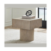 Lifestyle shot of the Jorielyn table styled on a light rug with modern decor to demonstrate scale and interior integration
