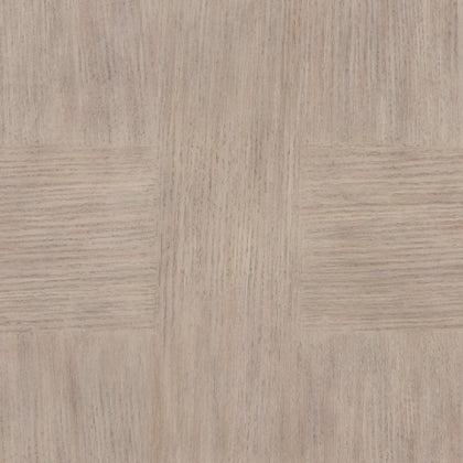 Close-up macro shot focusing on the textured light grey oak finish and the natural vertical wood grain of the pedestal base