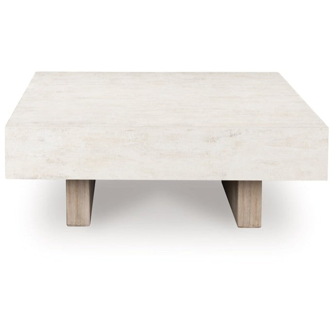 Front view of the Jorlaina square cocktail table featuring a light grey wood finish and a decorative parquet patterned block top