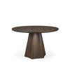 Front view of the Jovani round dining table in a dark mango wood finish featuring a sculptural faceted pedestal base
