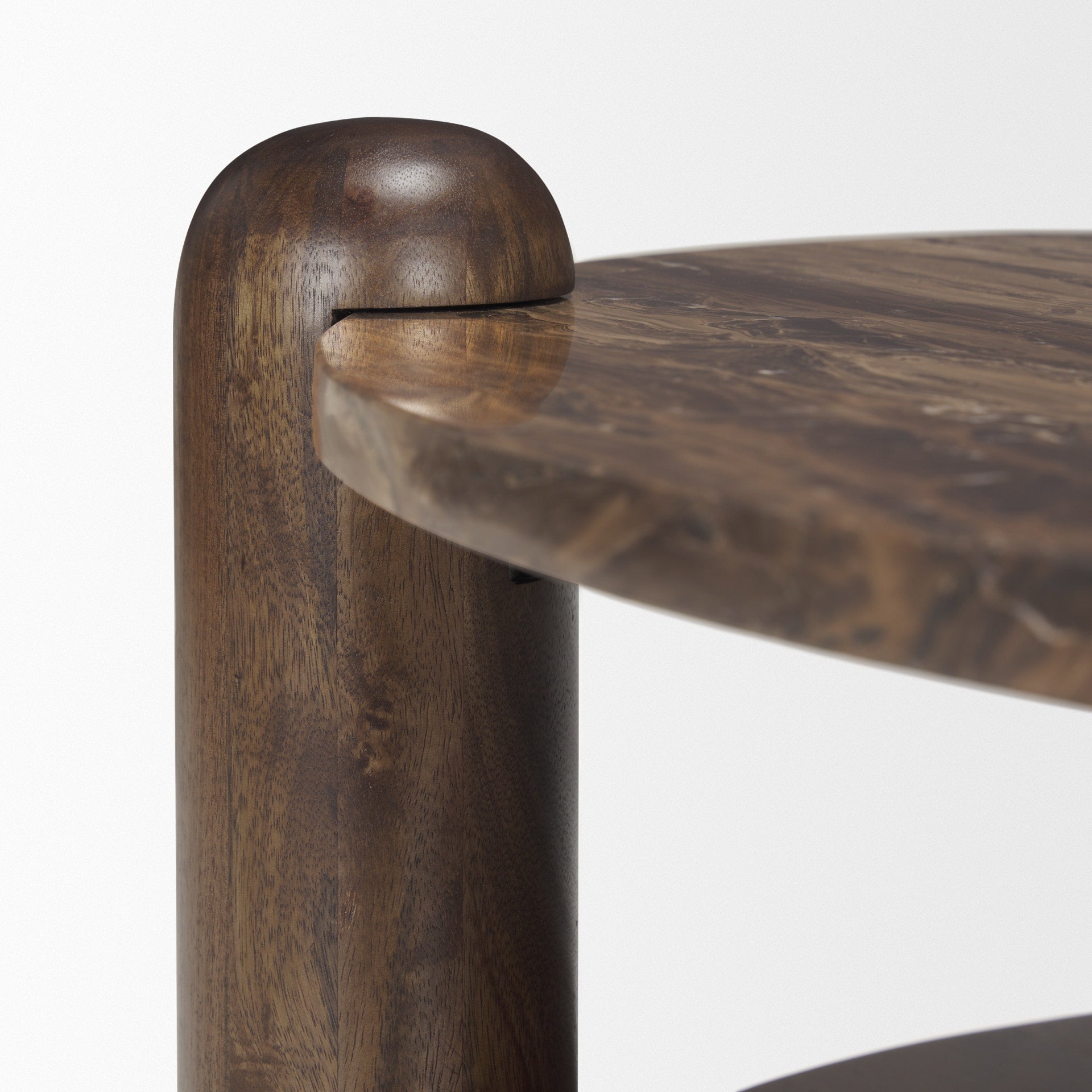Front view of the Jovia round coffee table featuring a cappuccino marble top and a dark brown mango wood lower shelf