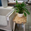 High-angle lifestyle shot emphasizing the table's tray-top design and functional surface area