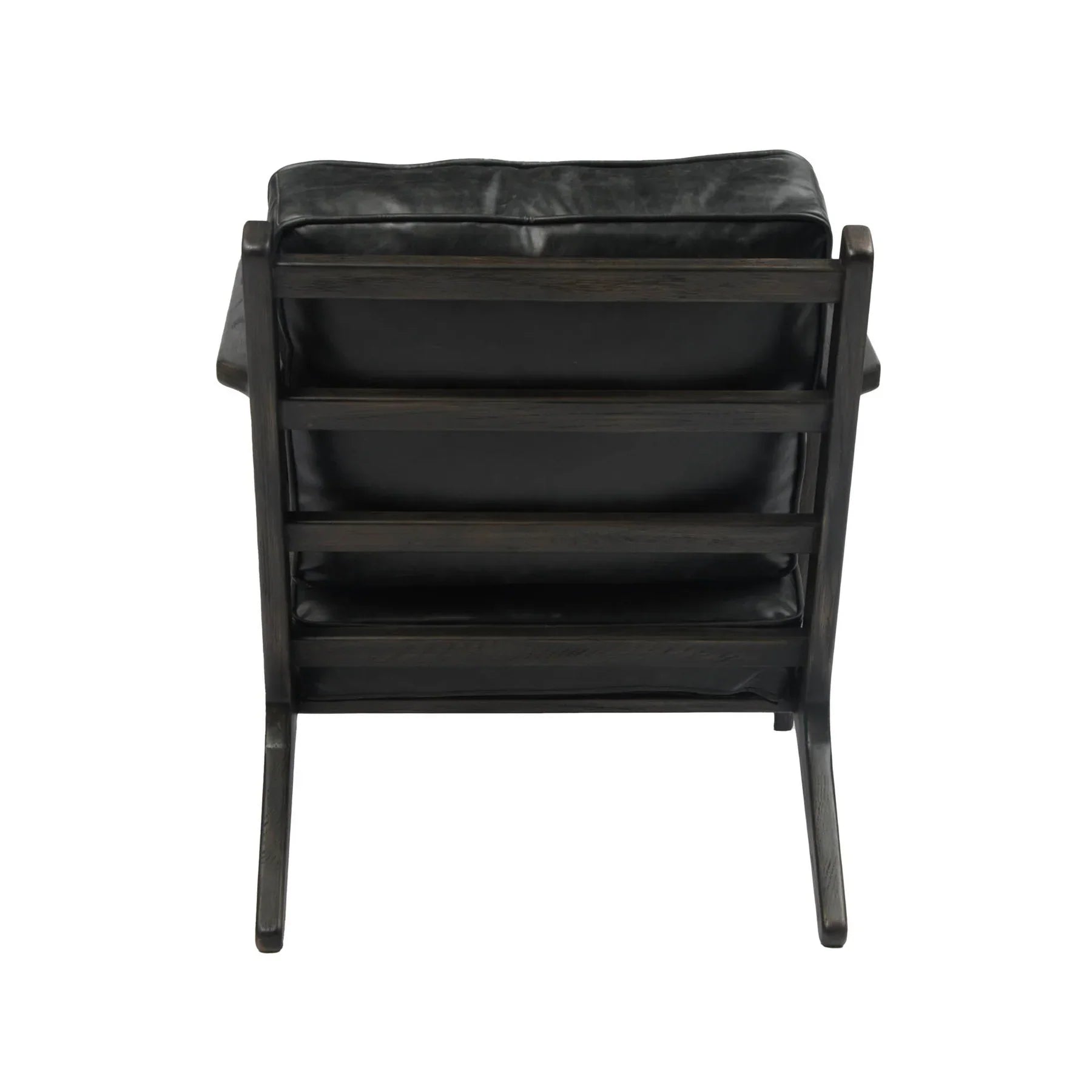 Junior arm chair in black leather styled in living room