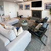 Junior arm chair in black leather in modern interior setting