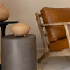 Junior arm chair in brown leather close-up detail