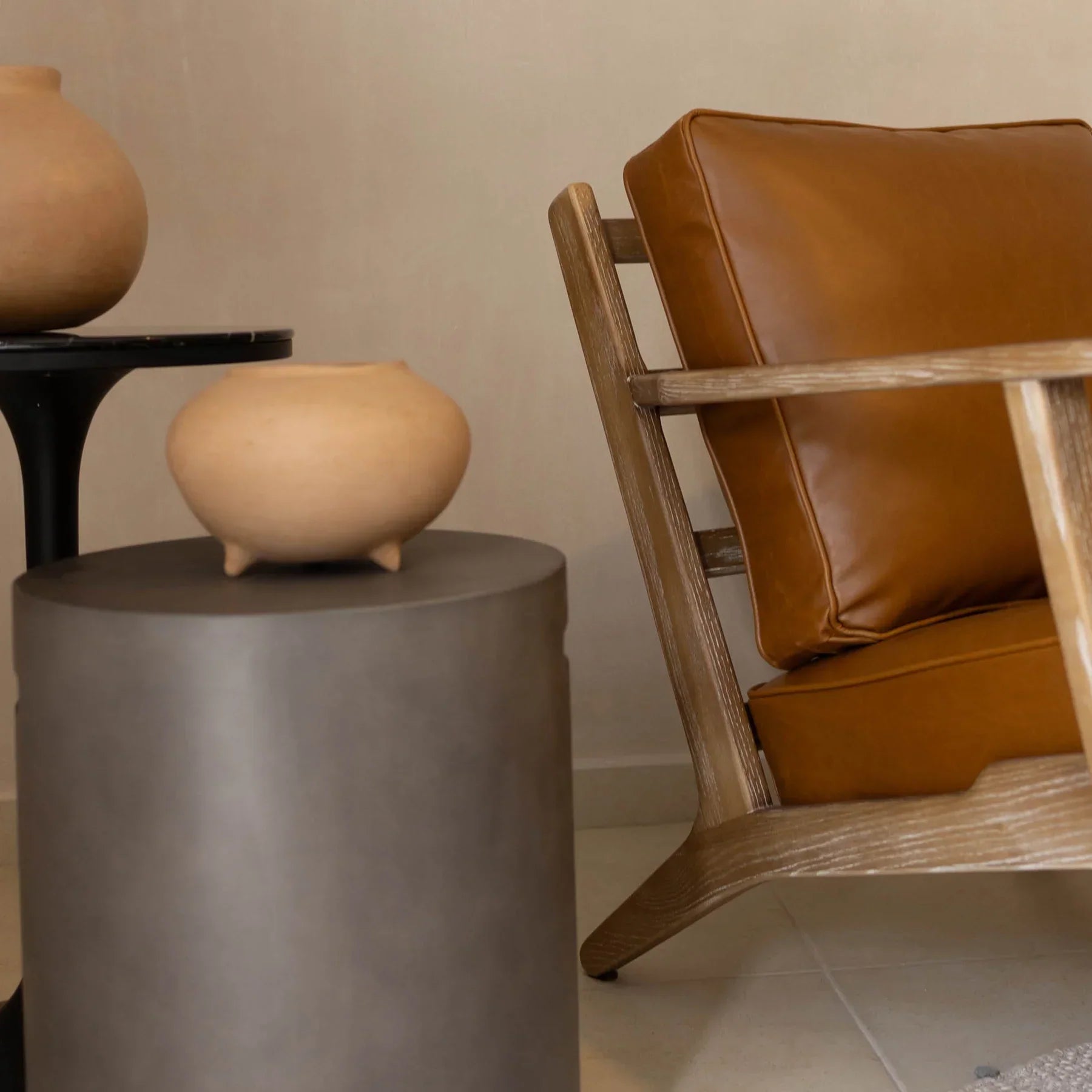 Junior arm chair in brown leather close-up detail