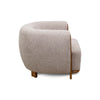 Direct back view of the Keji armchair showing its clean lines and organic rounded form