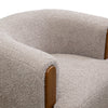 Side profile demonstrating the elegant slope of the backrest and low-profile wooden legs
