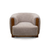Front view of the Keji Armchair in pebble grey bouclé featuring a rounded silhouette and integrated natural wood frame