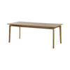 Final side profile view of the natural finish table highlighting the elegant taper of the legs and thin apron