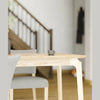 Detailed perspective view highlighting the elegant curved transition between the table legs and the apron