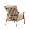 Kinsley club chair with light linen cushions and natural wood frame rear angled view