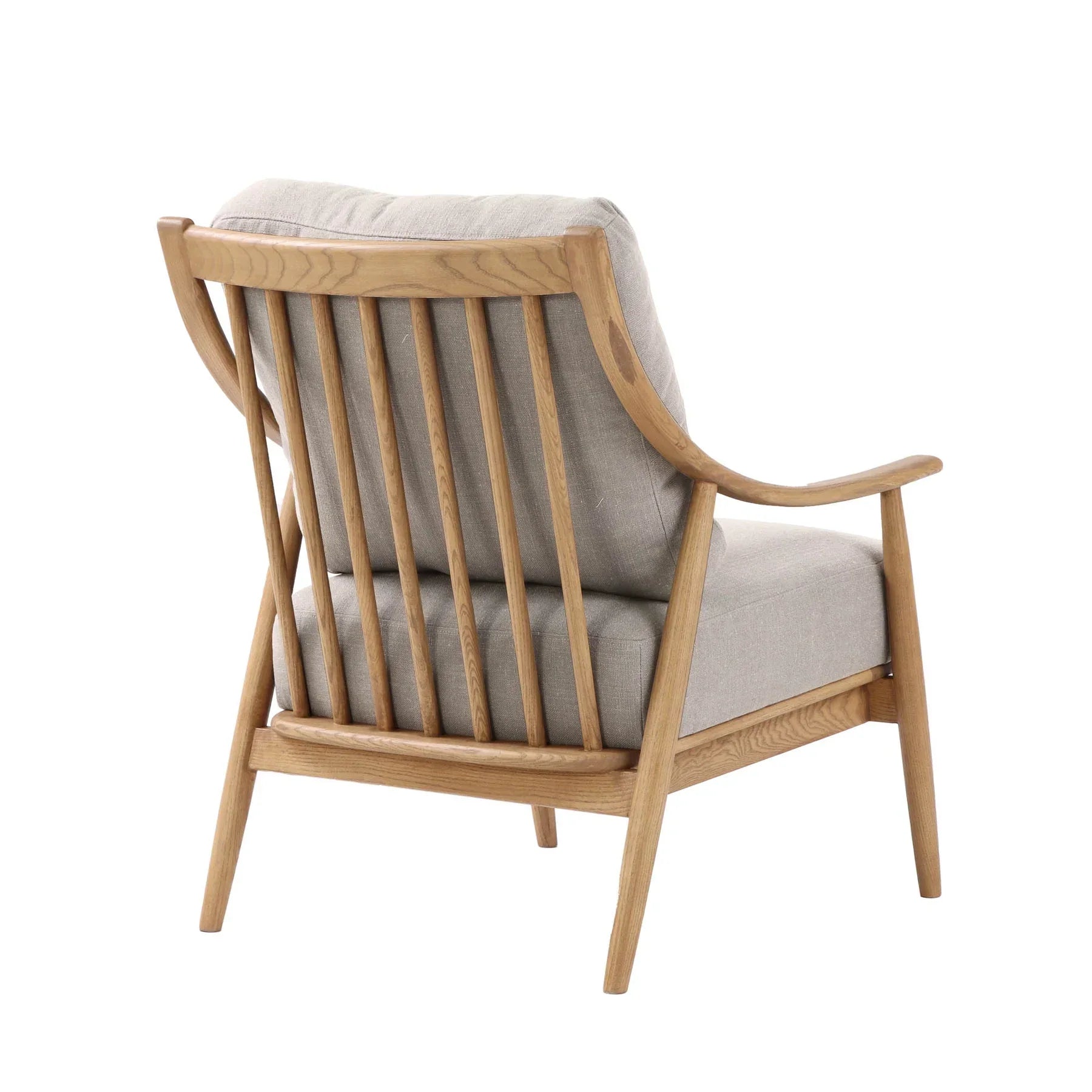Kinsley club chair with light linen cushions and natural wood frame rear angled view