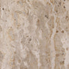 Macro detail shot focusing on the organic texture and polished finish of the Kiyomi cream marble tabletop