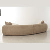 Rear angled view of the Klint taupe bouclé sectional sofa