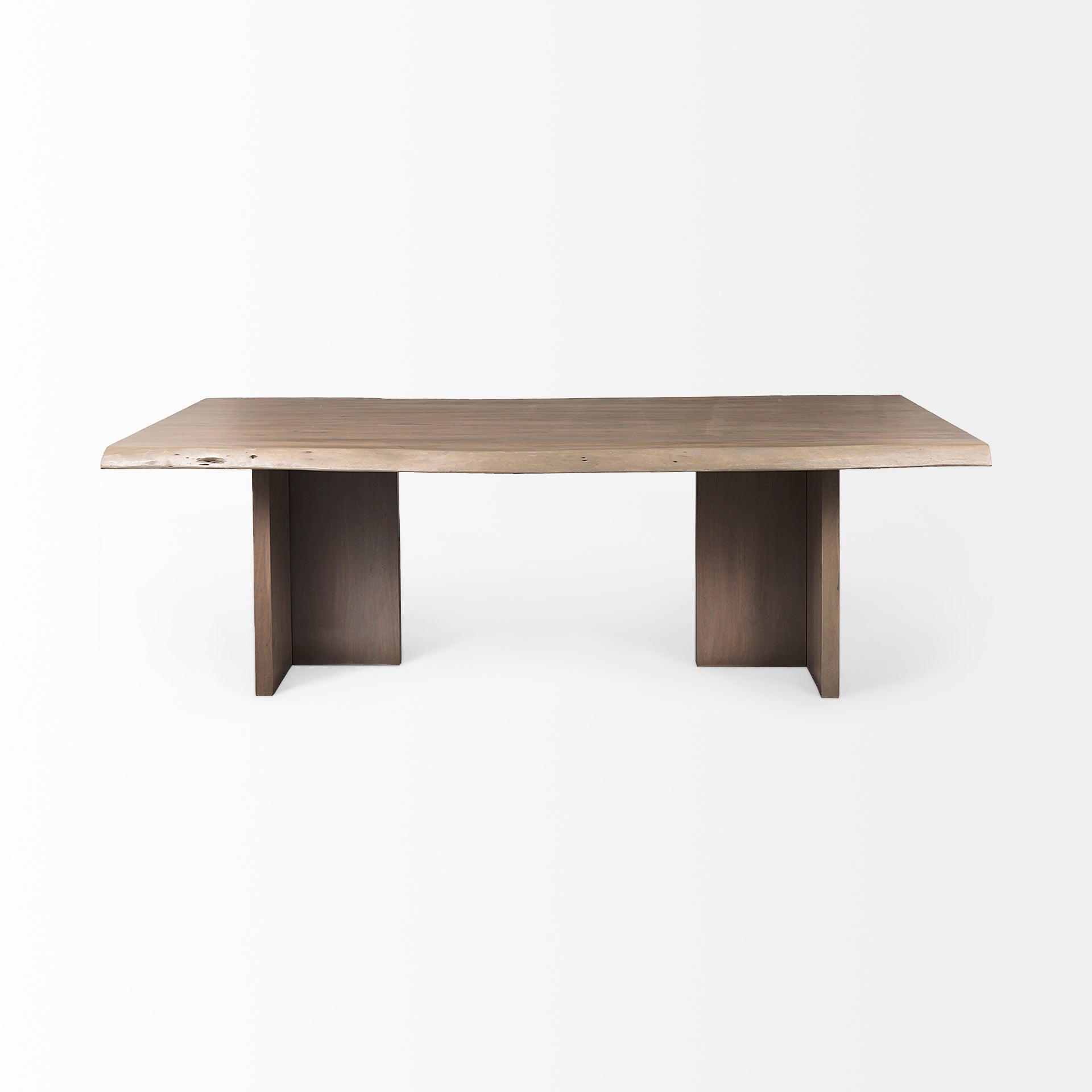 Front view of the Konstantin rectangular dining table featuring a medium brown wood finish with a natural live edge and thick slab pedestal legs